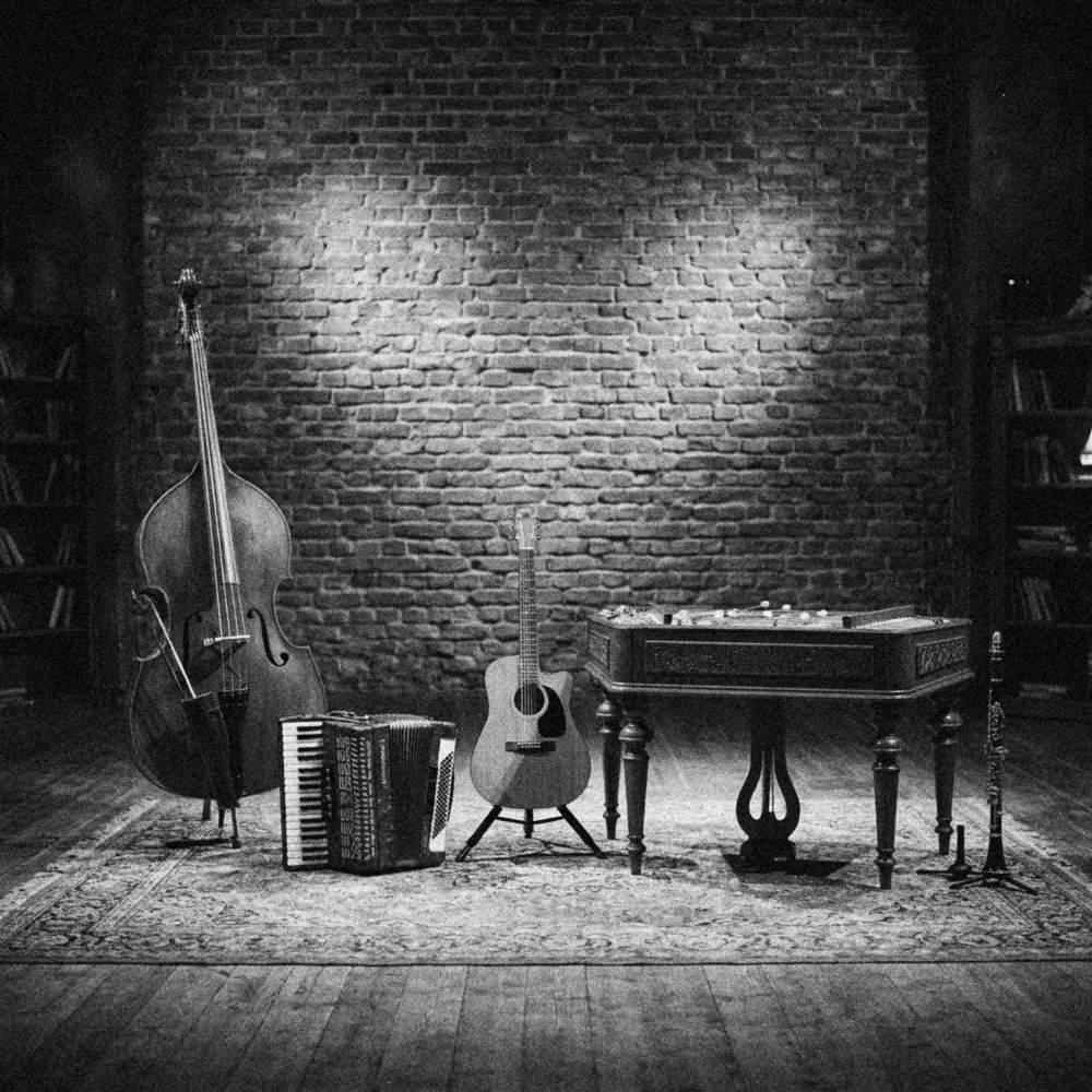 Les instruments du groupe sur scène : guitare, accordéon, clarinette, contrebasse, cymbalum.